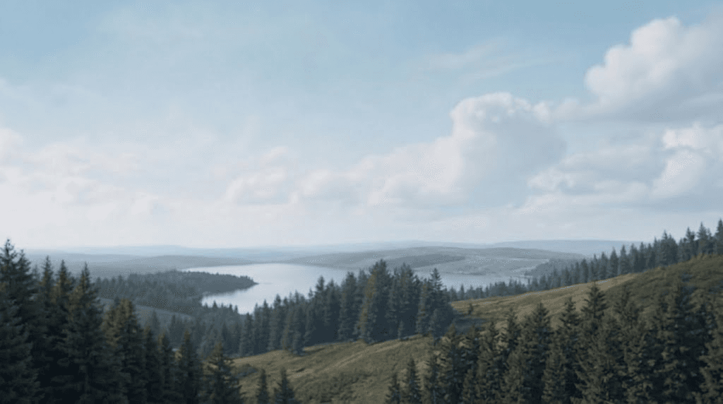 Valle de montaña y lago bajo un cielo abierto
